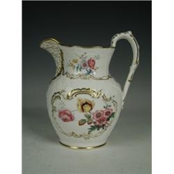 A 19th century English porcelain pineapple moulded jug with gilt 'c' scroll cartouches framing ha...