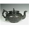 Image 1 : An early l9th century black basalt teapot with applied foliate scrolling decoration, impressed ma...