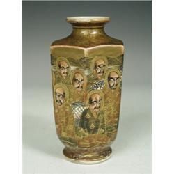 A Meiji period Satsuma hexagonal vase, decorated with numerous figures, heightened with gilding,...