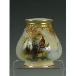 A Royal Worcester vase of lobed shape painted with pheasants and a pine branch, signed F. J. Bray...