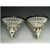 Image 1 : A pair of late 19th century continental porcelain wall brackets with applied putti and flowers, S...
