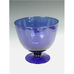 A 19th century Bristol blue glass bowl on a circular foot, 22cm high, 24.5 diameter Est. 100/130...