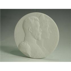 A Sevres commemorative circular parianware plaque to commemorate the visit by the Emperor and Emp...