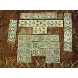 Forty one 18th century Italian/French ceramic tiles in four different patterns Est. 200/300...