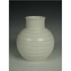 A Keith Murray Wedgwood pottery vase, of circular form with ribbed sides, printed KM mark, 15.8cm...