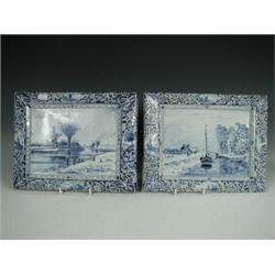 A pair of Edwardian rectangular Dutch Delft wall plaques, each decorated with rural scenes, marke...