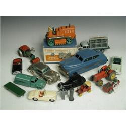 Seven Dinky model motor vehicles including a boxed 563 heavy tractor, a Simca cargo glass wagon,...