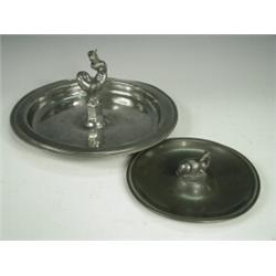 Two Just Anderson pewter dishes, one with a central figure of a mermaid, marked Just, Denmark, 19...