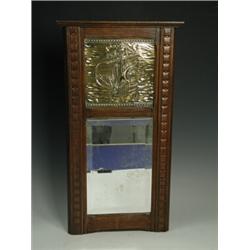 An Arts & Crafts oak mirror with a brass galleon inset above, 52cm high Est. 60/100...