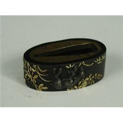 A Fuchi-Kashira, the Kashira worked in gold with a horned dear amidst branches, the Fuchi with a...