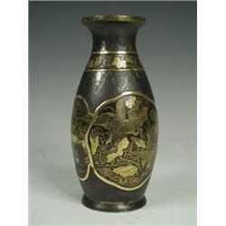 A Komai style vase, late 19th century, decorated with gilt panels of stork, dragon and a hut scen...