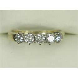 A 5-stone diamond ring, each stone approx 0.15ct, set in 18ct gold, size L 1/2 Est. 400/500...
