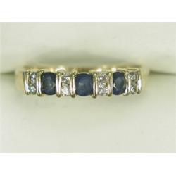 A sapphire and diamond dress ring set in 18ct gold, size L 1/2 Est. 150/200...