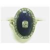 Image 1 : An enamel and diamond ring set with a central old cut diamond within a border of rose cut diamond...
