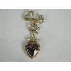 A late Victorian amethyst, seed pearl and rose cut diamond brooch/pendant, consisting of a bow br...