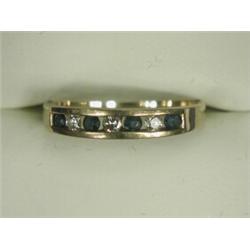 A sapphire and diamond half eternity ring in a 9ct gold mount, size O Est. 80/120...