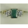 Image 1 : An emerald and diamond 3-stone ring, size K 1/2 (total diamond weight approx 0.80ct) Est. 550/650...
