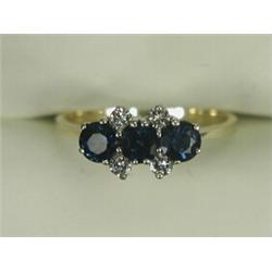 A 5-stone sapphire and diamond ring set in 18ct white gold to a yellow gold shank, size G Est. 18...