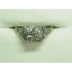 An antique old cut diamond 4-stone cluster ring with rose cut diamond set shoulders, set in 18ct...