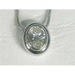 An oval diamond solitaire pendant of approx 1.06ct set in 18ct white gold, on a snake chain Est....