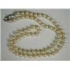 Image 1 : A single uniform row of 6.1mm cultured pearls with a silver clasp, 54cm long Est. 150/200...