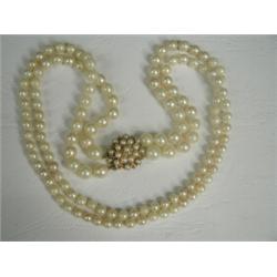 A two row graduated cultured pearl necklet (from 4.7 to 7.5mm) with a 9ct gold cultured pearl set...