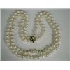 Image 1 : A Mappin & Webb double row choker of 7.9mm cultured pearls with an 18ct gold clasp set with a dia...