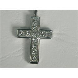 A Mappin & Webb 18ct white gold cross set with eleven Princess cut diamonds, 3cm long, on an 18ct...