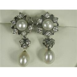 A pair of cultured pearl and diamond drop earrings, 2.5cm long (butterflies not included) Est. 20...