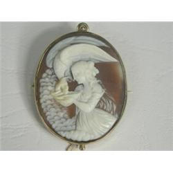 A cameo brooch/pendant depicting Leda and the swan, set in 9ct gold, 5cm long Est. 150/200...