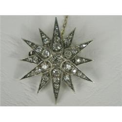 A Victorian diamond star brooch set with old cut stones (total approx 3cts), 3.5cm in diameter, w...