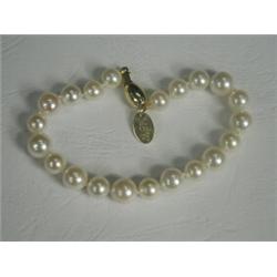 A Mappin & Webb cultured pearl bracelet consisting of twenty one pearls of 7mm and 8.3mm with an...