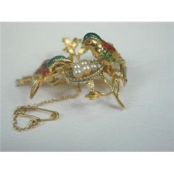 An 18ct gold and enamel and cultured pearl brooch, 4.5cm long, with a safety chain Est. 200/300...