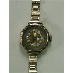 A lady's 9ct gold-cased wristwatch with 9ct gold bracelet strap Est. 50/80...