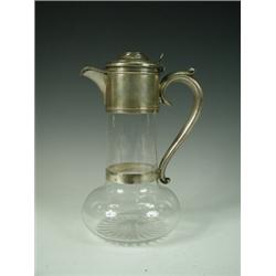 A late Victorian silver mounted claret jug with star cut base, London 1895, W.H. & Co. Ltd., 24cm...