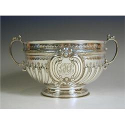 A Victorian silver twin-handled rose bowl with gadrooned body and rope twist border, with initial...