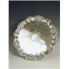 Image 1 : A silver salver with a shaped border, with chasing, and a rococco engraved cartouche, maker's mar...