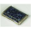 Image 1 : A French white metal box, the hinged cover with enamel panels in the form of Lapis Lazuli, the si...