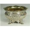 Image 1 : A George III silver salt with a gilt interior, the part lobed body with two applied rococo cartou...