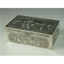 A Chinese white metal cigarette box with panels of figures and birds on branches, stamped China/S...