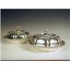 Image 1 : A pair of Edwardian silver entree dishes and covers, of shaped form with gadrooned borders, and s...
