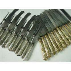 Two sets of late 18th/early 19th century flatware: a set of six knives and forks, with sterling s...
