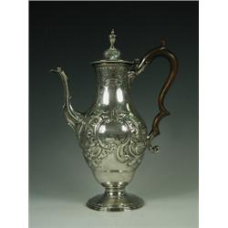 A George III silver coffee pot, with later chased decoration, maker's mark for William Sumner, Lo...