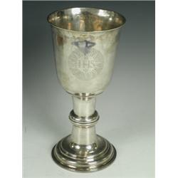 A George I silver chalice, the bell shaped bowl with sacred monogram 'In Hoc Signo Vincit' within...