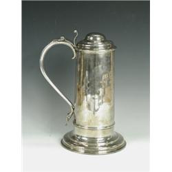 A George II silver lidded tankard of plain banded uptapering cylindrical form by Joseph Allen and...