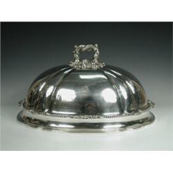 A Victorian silver plated dish cover, with a cast and chased handle, gadrooned moulding, with a h...