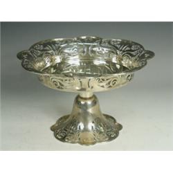 An early Edwardian silver cakestand having a pierced rim and foot, Birmingham 1905 Est. 180/220...