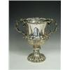 Image 1 : An early Victorian silver two handled cup, with repousse and applied relief foliate decoration on...