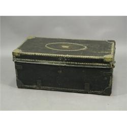 A 19th century camphorwood and leather trunk with brass studwork and an oval name plate W H CONEL...