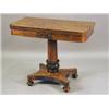 Image 1 : A Victorian rosewood fold over card table with a tapering column on a quadripartite base with tur...